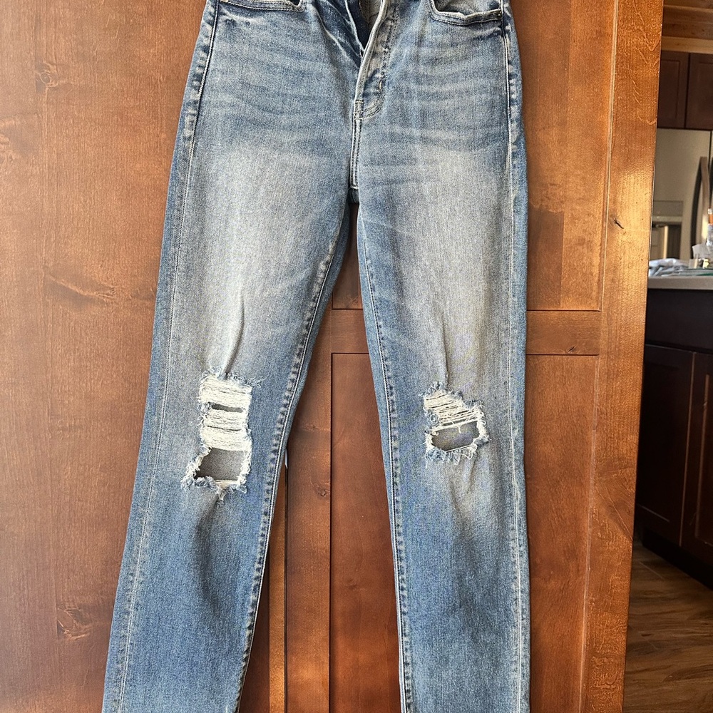 Distressed Blue Denim Jeans